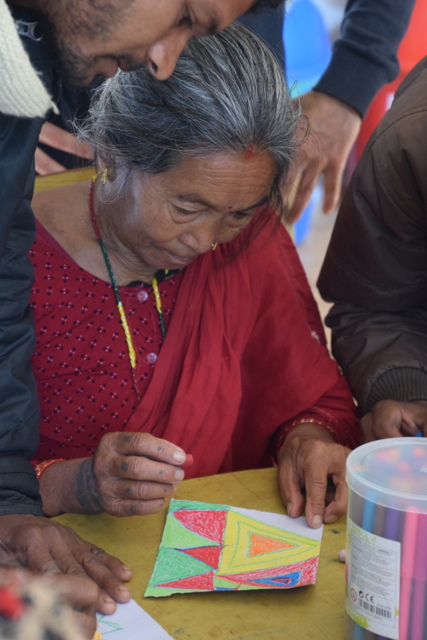 This grandmother was totally engrossed in her art making.